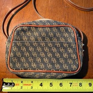 Dooney&Bourke purse, with logo canvas. leather strapped shoulder bag